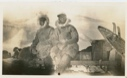 Image of MacMillan and Borup sitting on sledge